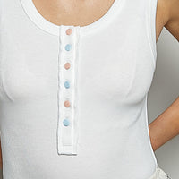 Off-white ribbed tank top neckline with round neck and blue button placket