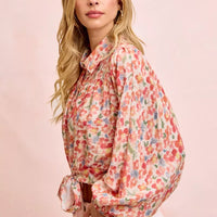 Floral print crop shirt with standing collar, button front, and tied hem