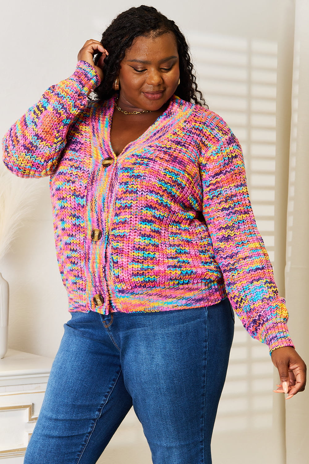 Multicolor v-neck knit cardigan with button-front, long sleeves and ribbed cuffs