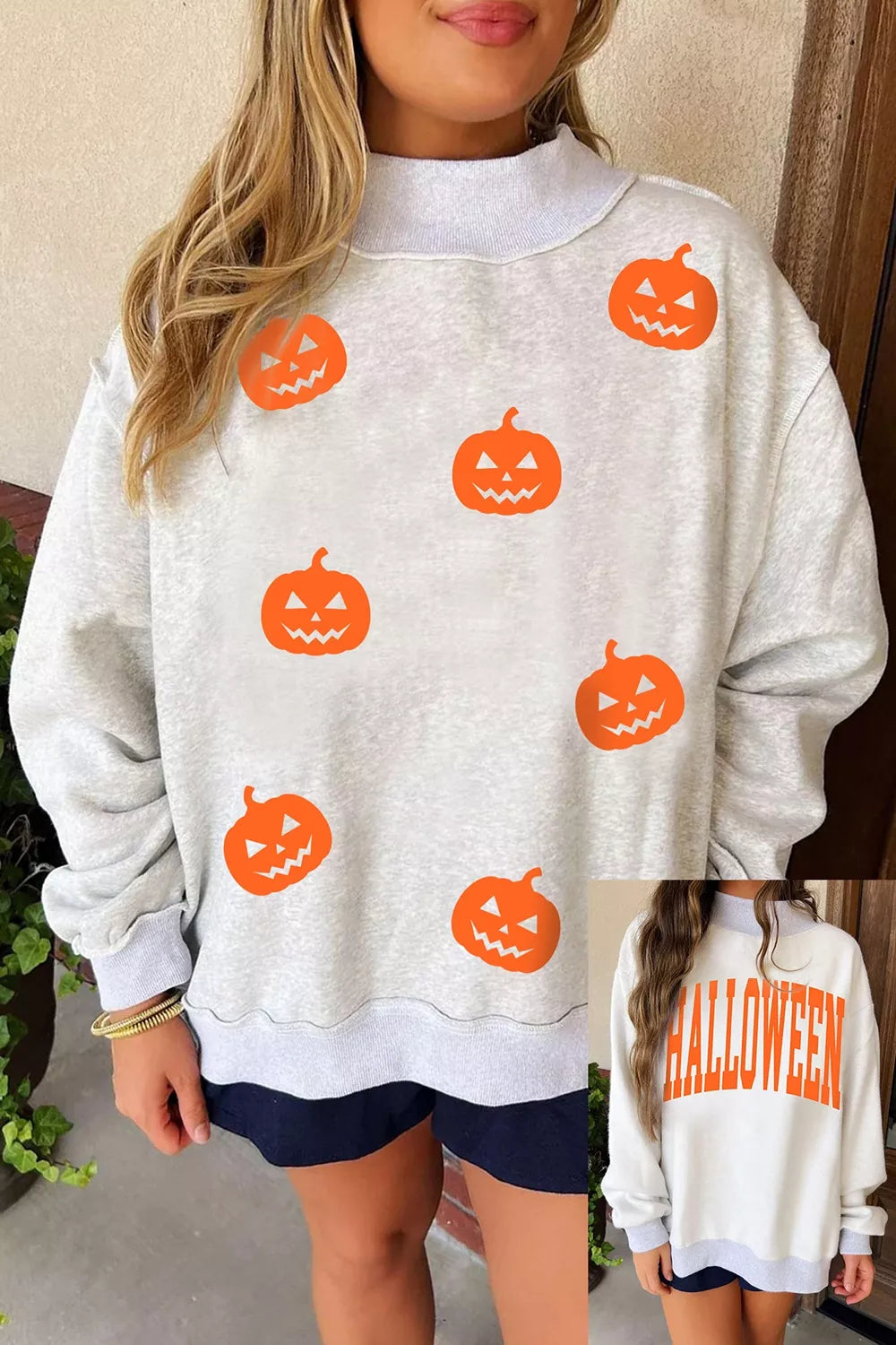 Light gray sweatshirt with orange pumpkin face print, mock neck