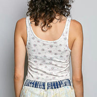 Ivory floral ribbed tank top, back view, scoop neck and all-over print