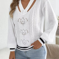 White cutout cable knit sweater with ribbed V-neck and striped cuffs