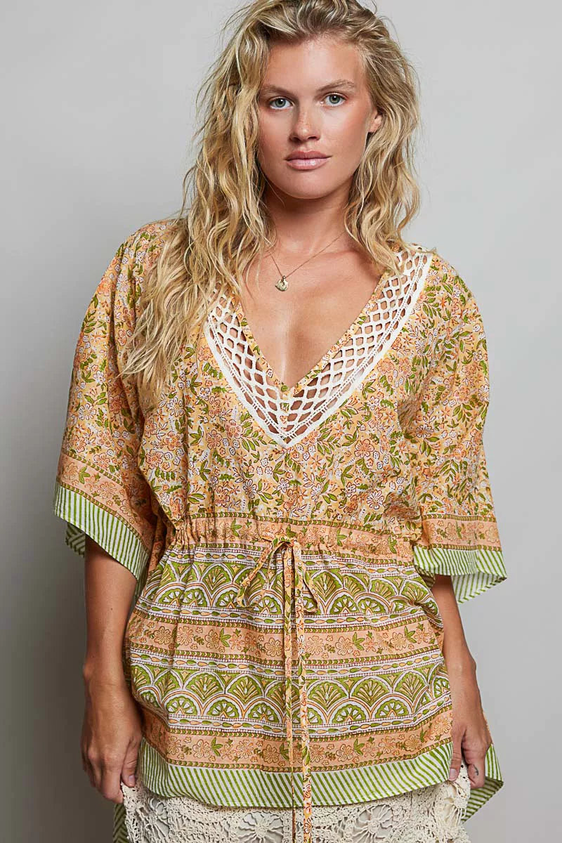 Coral floral tie-front boho blouse with V-neck and three-quarter loose sleeves