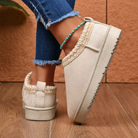 Light beige platform ankle boots with beaded ankle strap and chunky tread sole