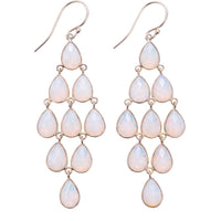 Silver opal teardrop chandelier earrings with dangling gemstone drops and fishhook backs.