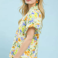 Green mix watercolor floral blouse with three-quarter puff sleeve and elastic cuff