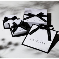 Jewelry gift boxes with black bows and LATELITA cards