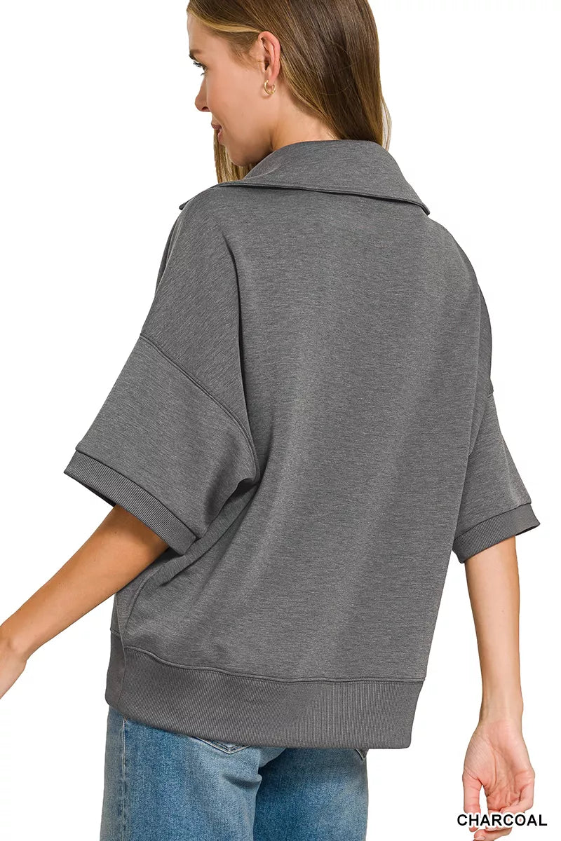 Charcoal collared short-sleeve pullover, back view with seam detail