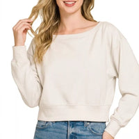 Bone cropped boat-neck pullover sweatshirt with long sleeves and relaxed fit