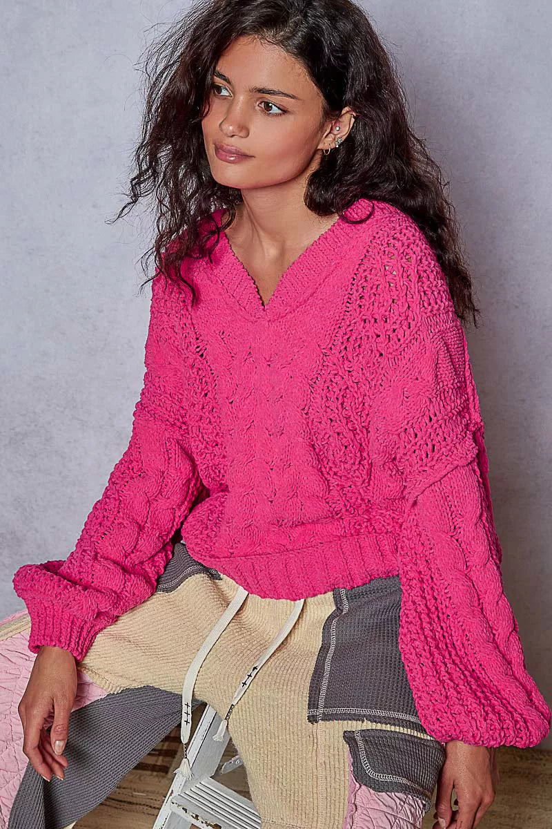 Fuchsia cable-knit V-neck cropped sweater with long sleeves