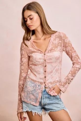 Dusty rose sheer mesh V-neck cardigan with button front and allover bow-pattern, long sleeves