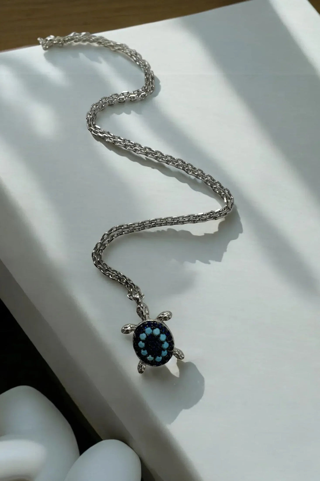 Silver chain turtle pendant necklace with dark blue enamel turtle shell