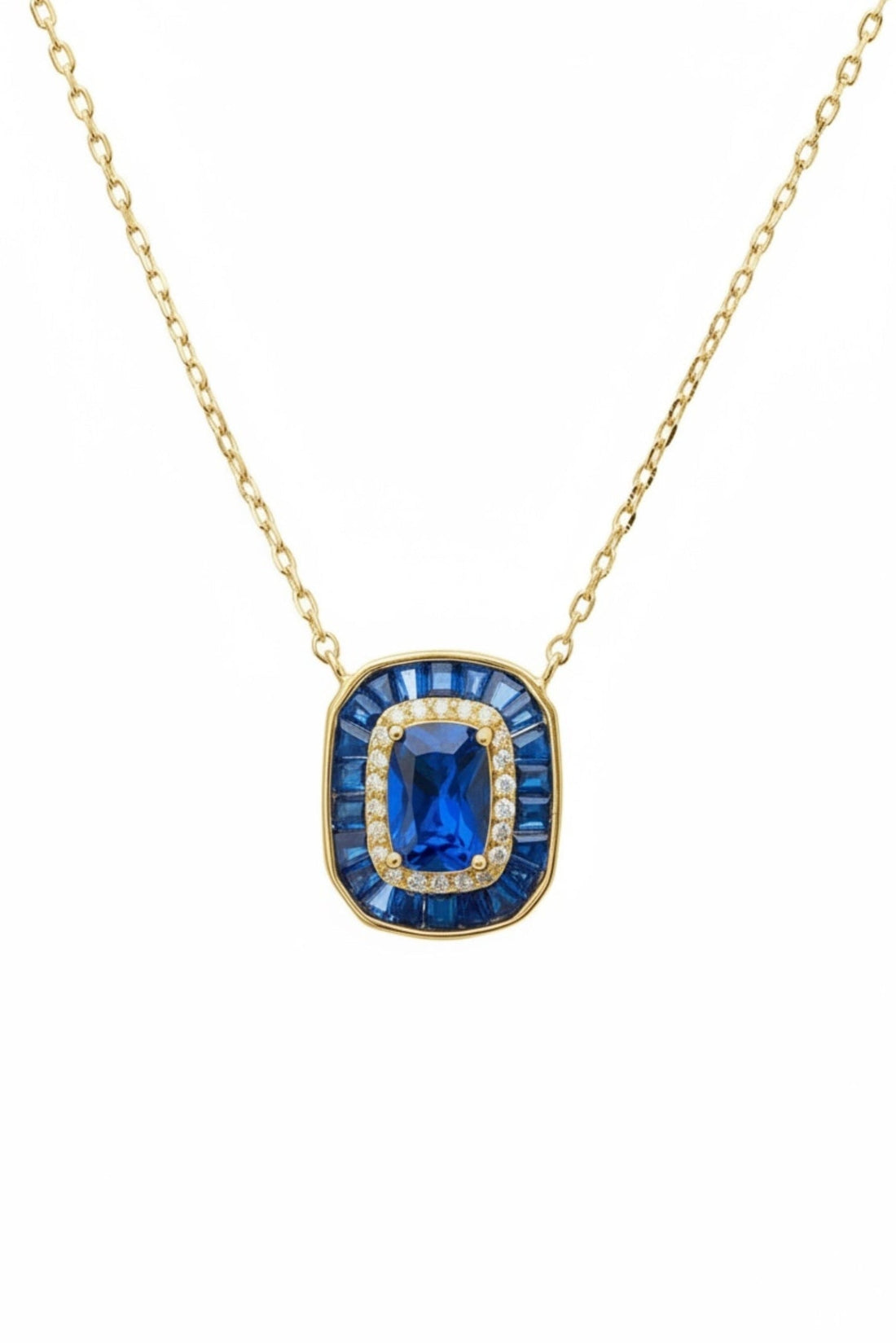 Gold pendant necklace with square sapphire blue gemstone and bezel frame