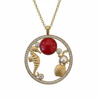 Gold-tone pendant necklace with circular seashell charms and red coral bead centerpiece
