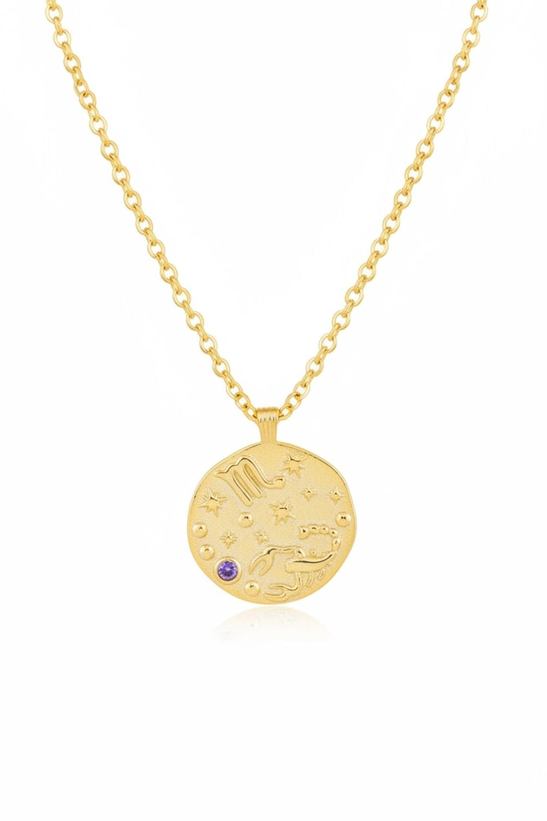 Gold zodiac talisman necklace with round pendant and blue birthstone