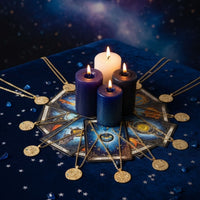Gold-tone Leo zodiac pendant necklace on starry table scene with candles