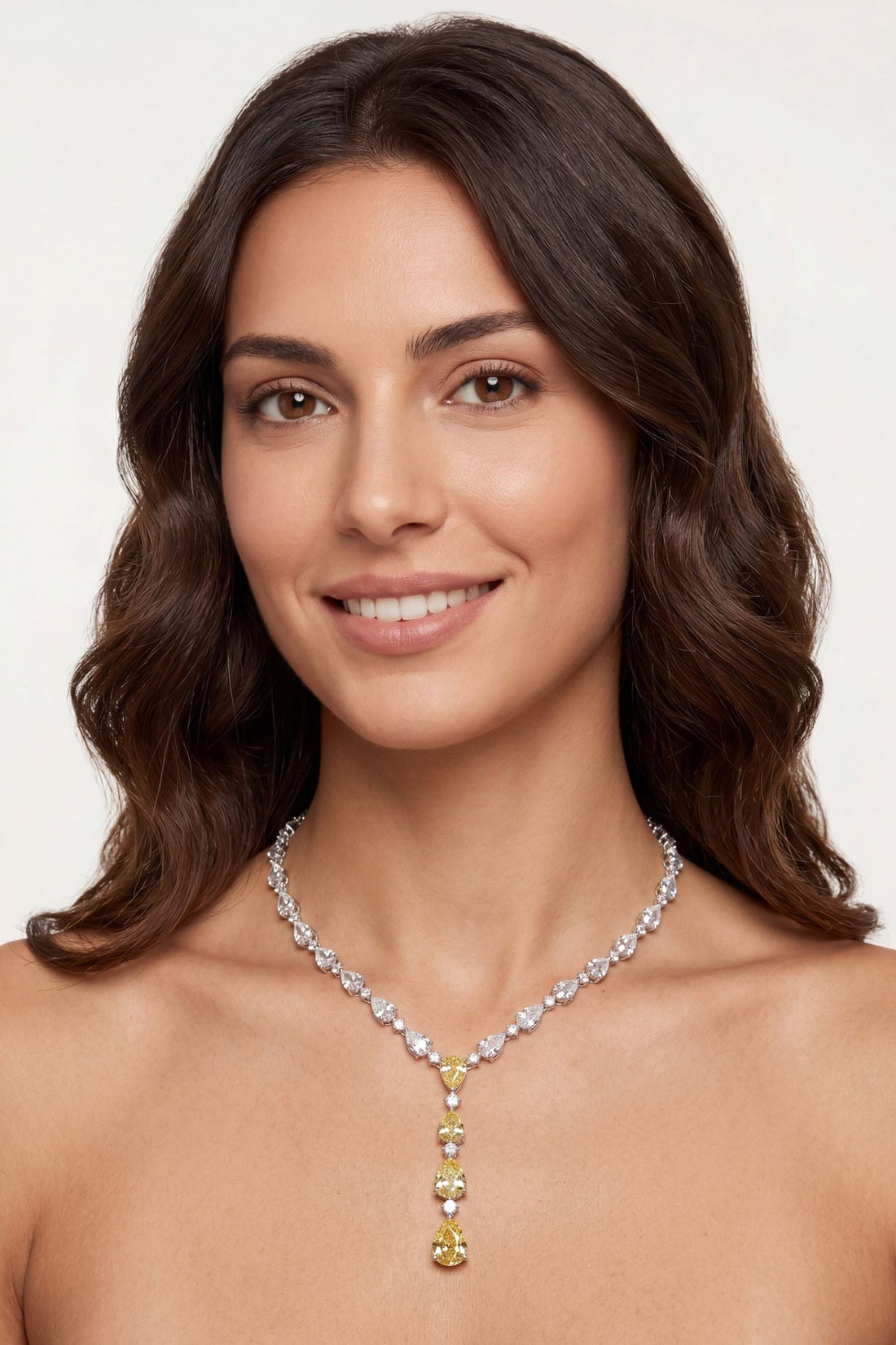 Silver statement necklace with clear crystals and three yellow topaz drops