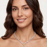 Silver statement necklace with clear crystals and three yellow topaz drops