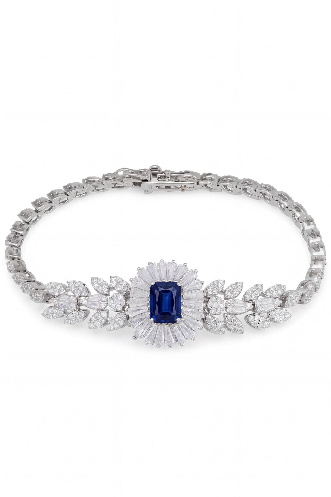 Silver gemstone bracelet with blue sapphire center and leaf motif