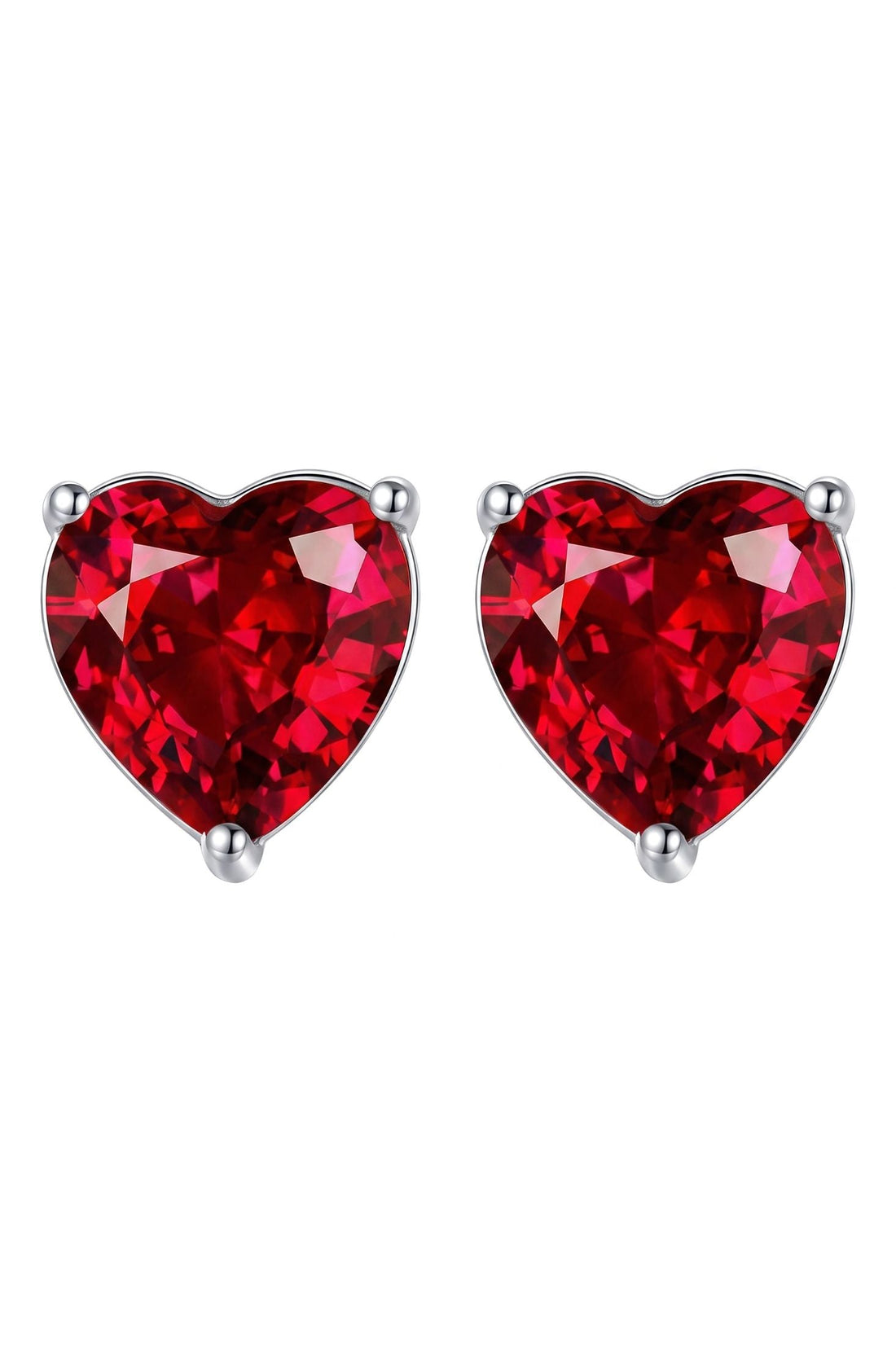 Silver heart stud earrings with red garnet-like gemstone, polished metal posts