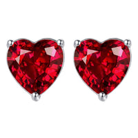 Silver heart stud earrings with red garnet-like gemstone, polished metal posts