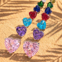 Heart stud earrings with assorted colorful faceted gemstones arranged
