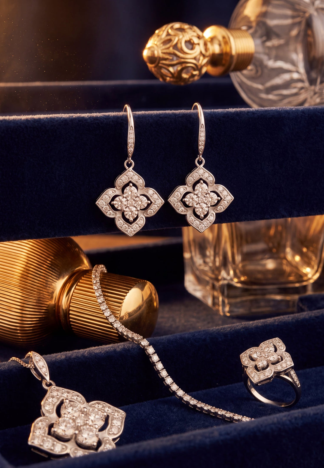 Silver CZ clover flower drop earrings, shown side by side