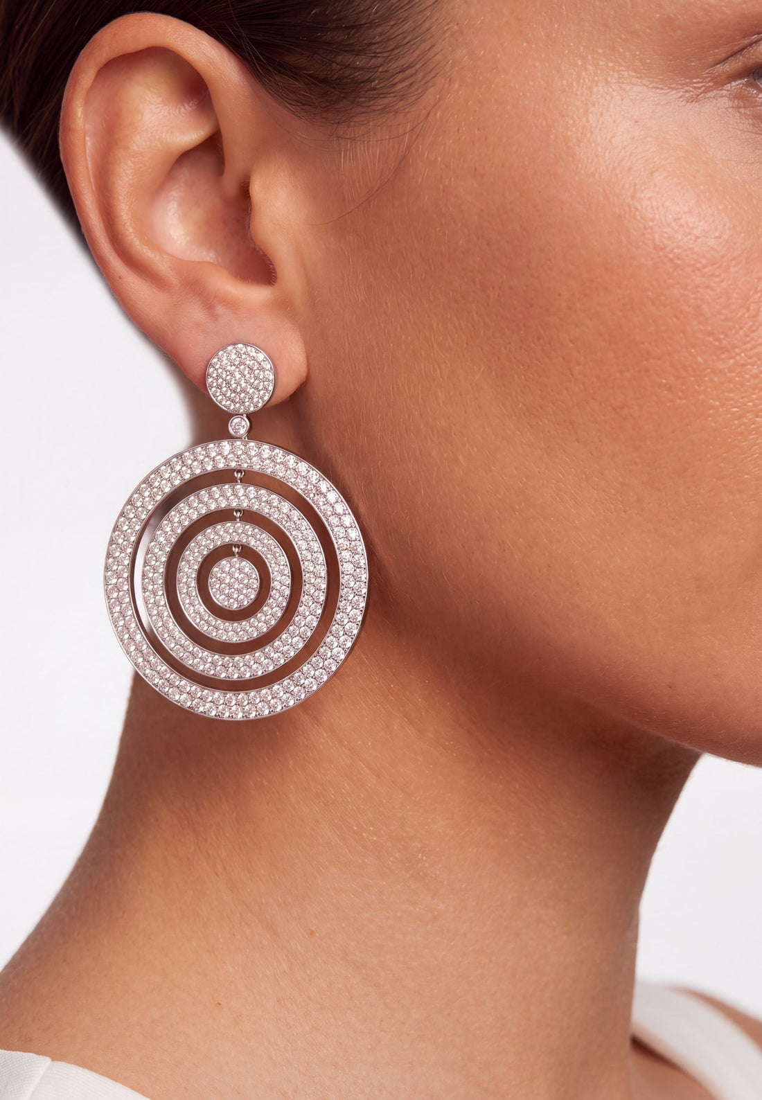Silver statement drop earring with concentric pavé circles