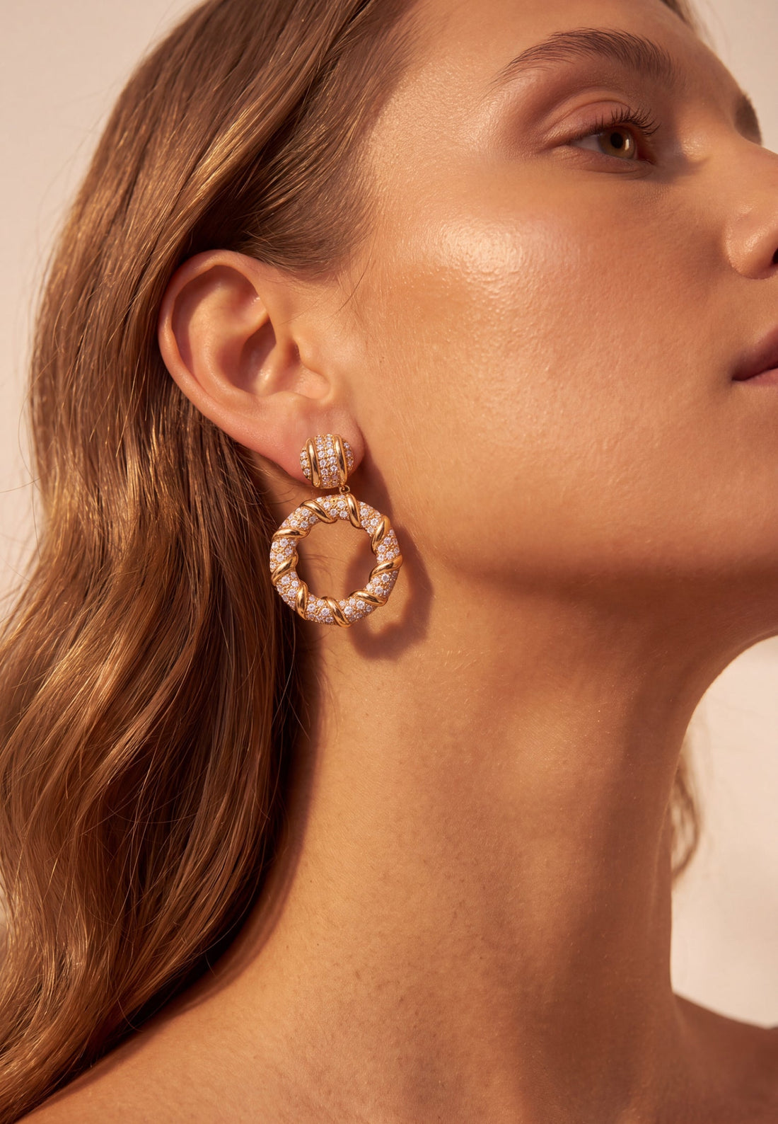 Gold drop earrings with pavé hoop and crystal stud