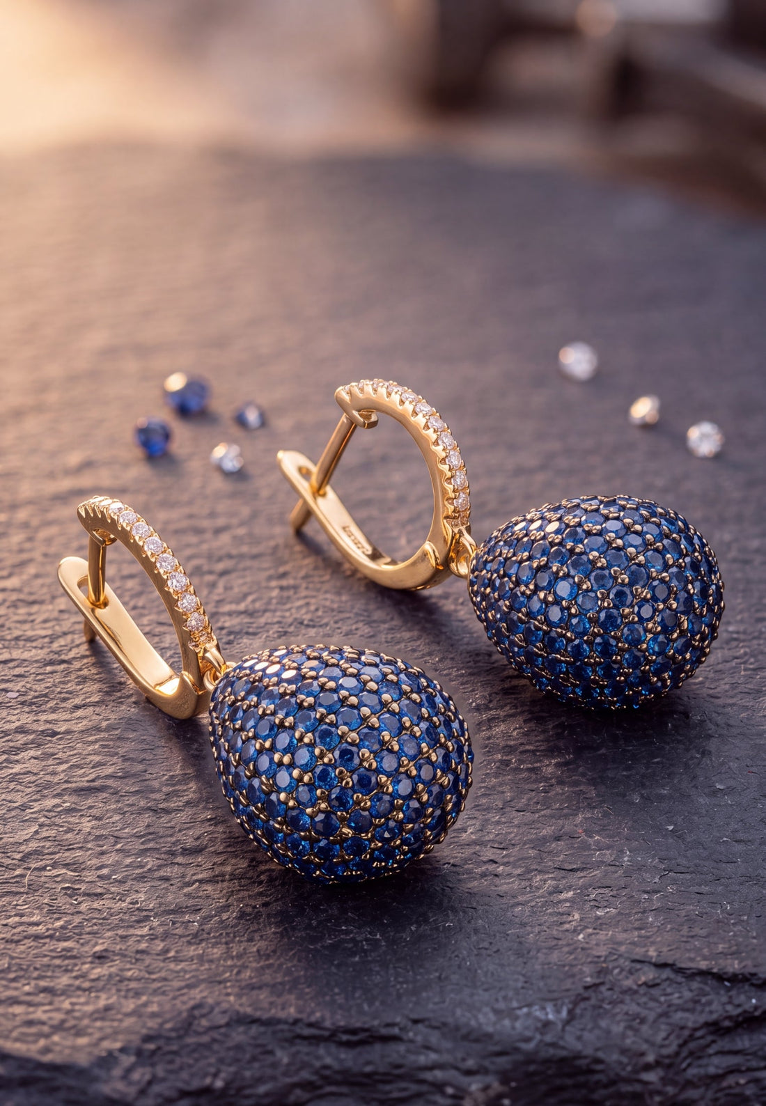 Gold hoop drop earrings with sapphire blue pavé gemstone domes