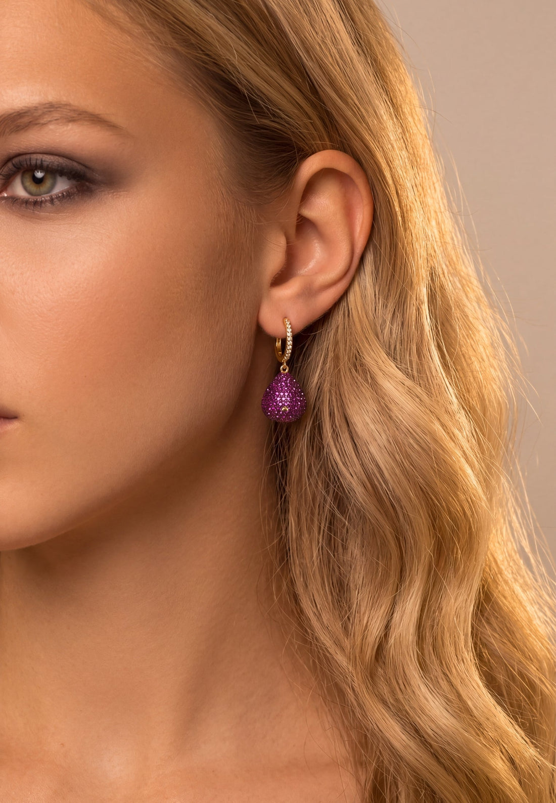 Gold hoop earrings with ruby pear-drop gemstone pendant