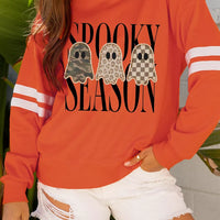 Orange ghost graphic pullover sweatshirt with varsity striped sleeves