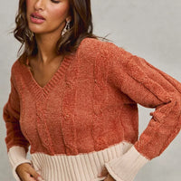 Rust cropped V-neck chenille cable-knit sweater with contrast ribbed bottom band