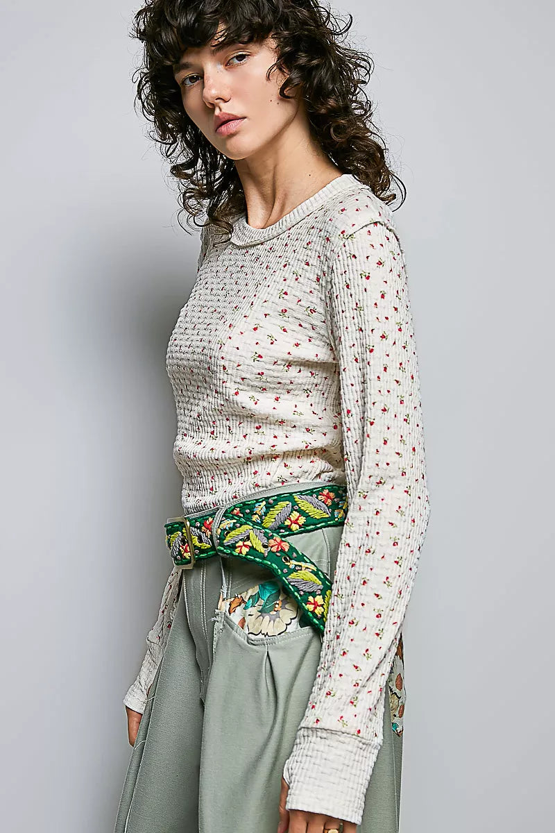 Ivory ribbed knit long sleeve top with tiny floral print and crew neckline