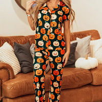 Orange and dark green pumpkin-printed short-sleeve top and matching lounge pants