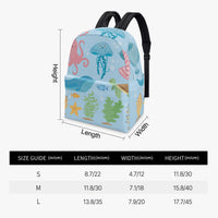 Kids canvas backpack with colorful undersea creatures print and black webbed handle.