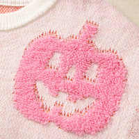 Dusty pink knit sweater with a pink pumpkin patch and ribbed white neckline