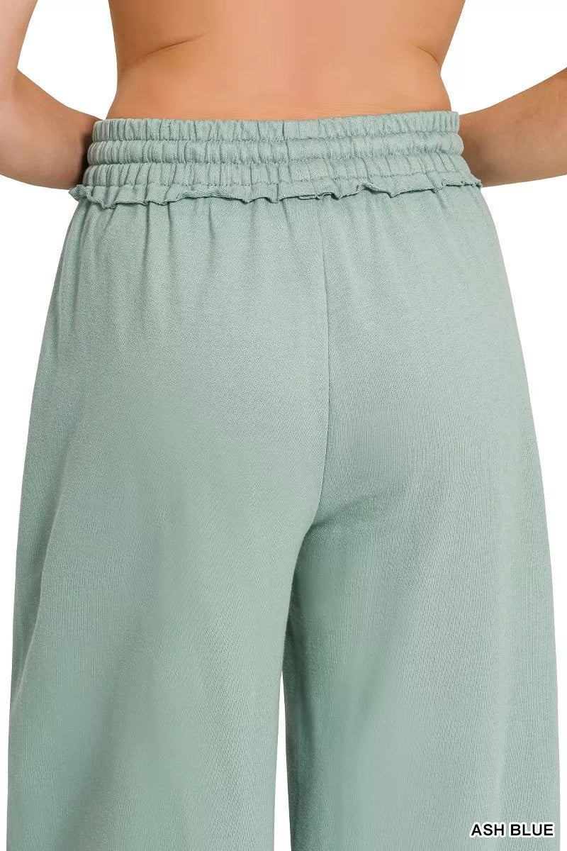 Ash blue French terry wide-leg sweatpants with relaxed fit and front pockets