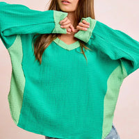 Textured jersey color block top, emerald green body with light green side panels
