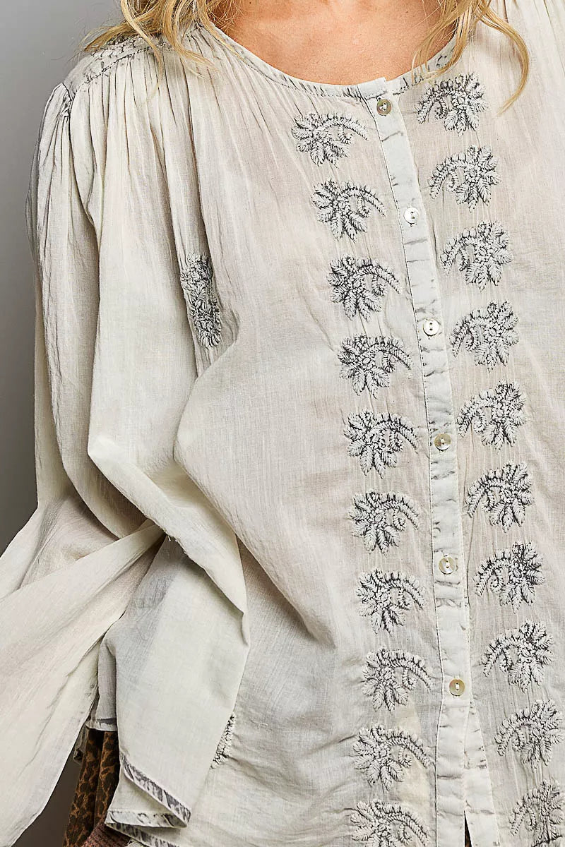 Embroidered pale grey button-front woven shirt with floral motifs, long sleeves