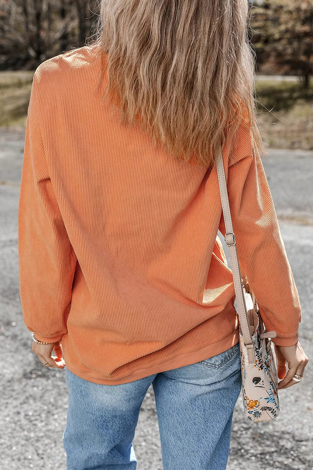 Orange sherbet tunic sweatshirt back view, ribbed crew neck and long sleeves