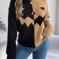Two-tone pumpkin face graphic sweater, camel/black zip-front knit, long sleeves