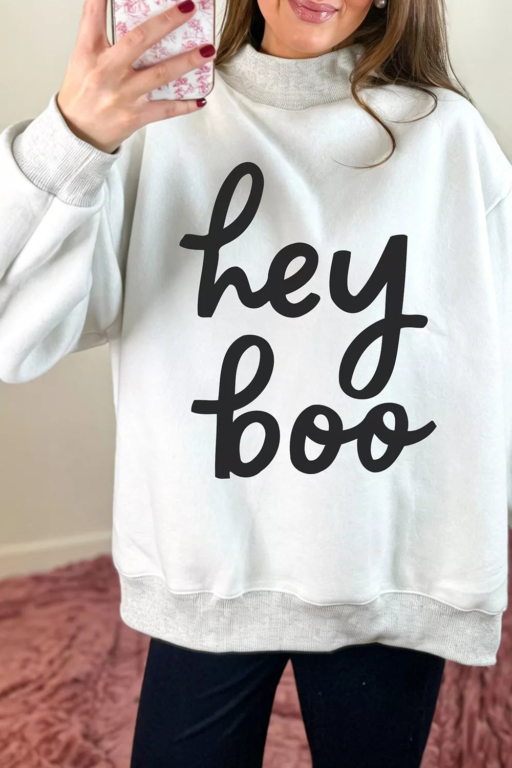 Reversible white mock neck tunic sweatshirt with "hey boo" black script graphic