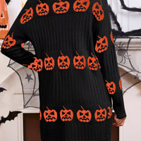 Black open-front knit cardigan with orange jack-o'-lantern motif pattern, long sleeves