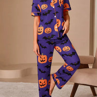 Halloween pajama set: purple short-sleeve button top and straight-leg pants with orange pumpkin bat print