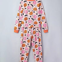 Dusty pink pumpkin-print pajama set with long sleeves and orange-trim cuffs