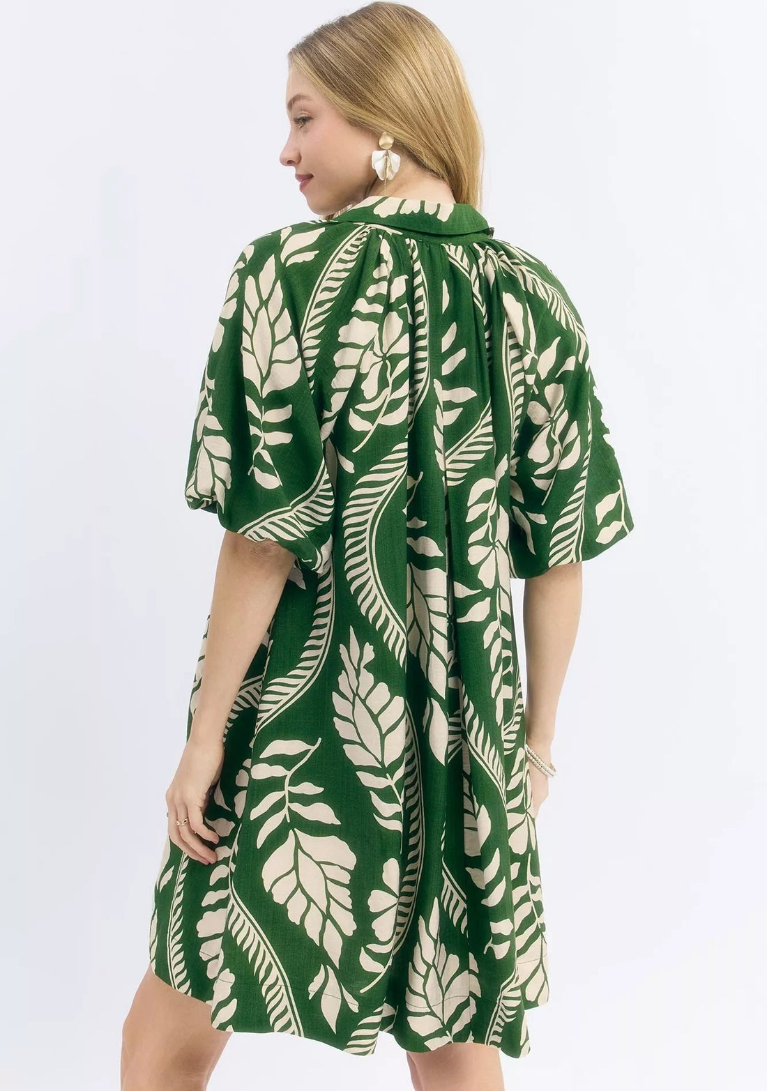Green and cream leafy print mini dress with V-neck and short flutter sleeves