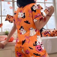 Orange Halloween button-down top and matching shorts, allover ghost and bat pattern