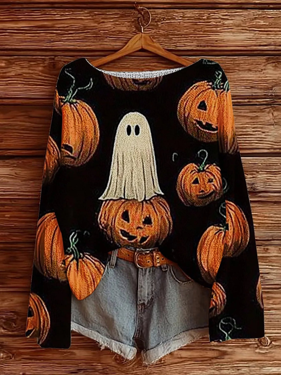 Plus-size Halloween boat-neck sweater in black with pumpkin and ghost graphics
