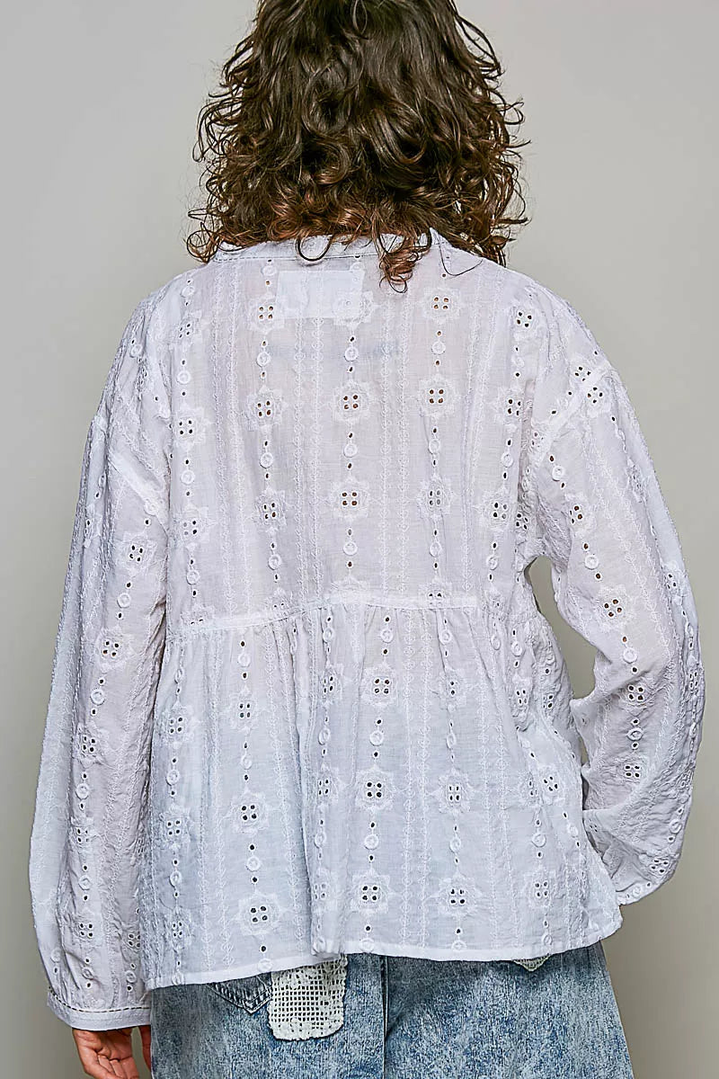 Off-white long-sleeve eyelet blouse with gathered back yoke and cutwork rows